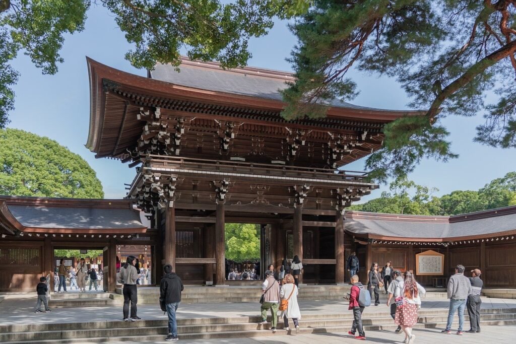 Entrance gate of Meiji Shrine in Tokyo, a traditional Shinto shrine surrounded by nature.