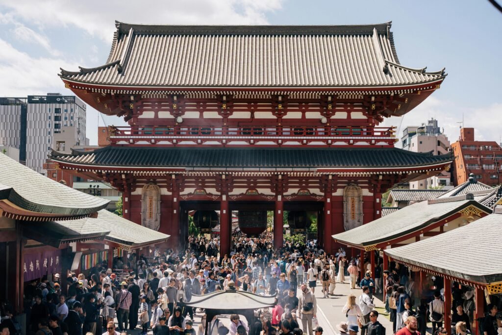 pexels-photo-32416124-32416124 Vibrant scene at Senso-ji Temple in Tokyo on a sunny day, featured in a 2 week Japan itinerary, showcasing traditional architecture.