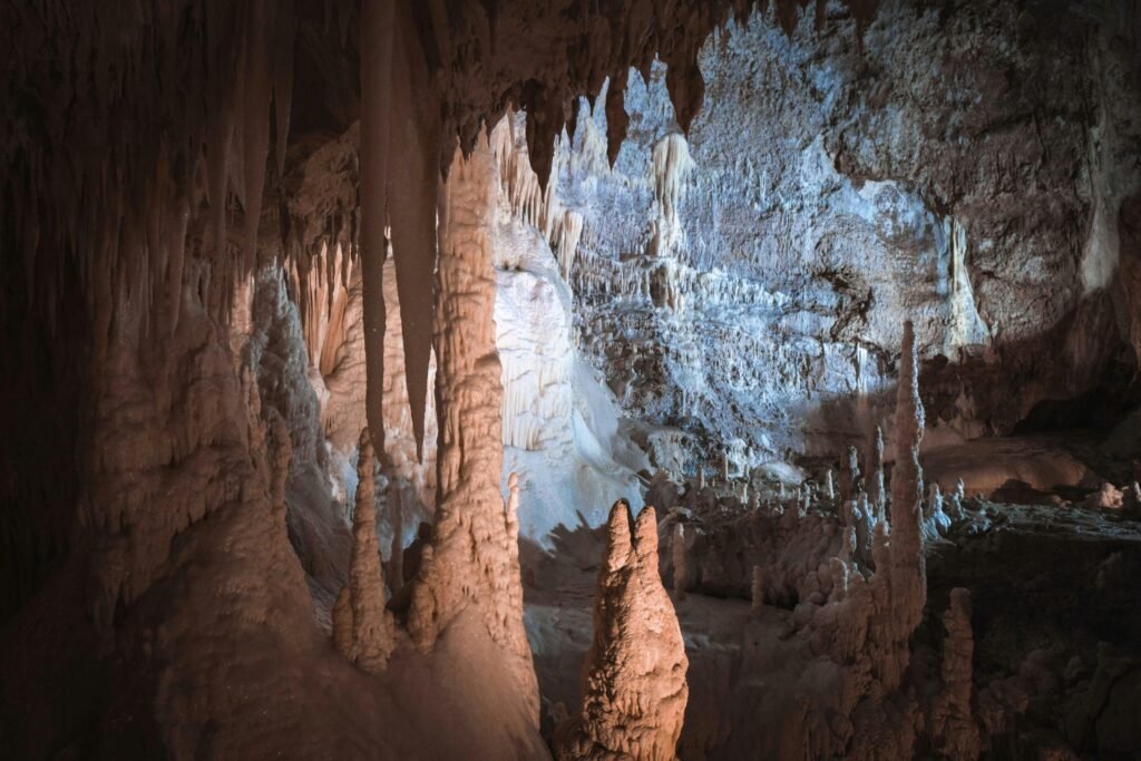 Explore intricate cave formations with stunning stalactites and natural textures.