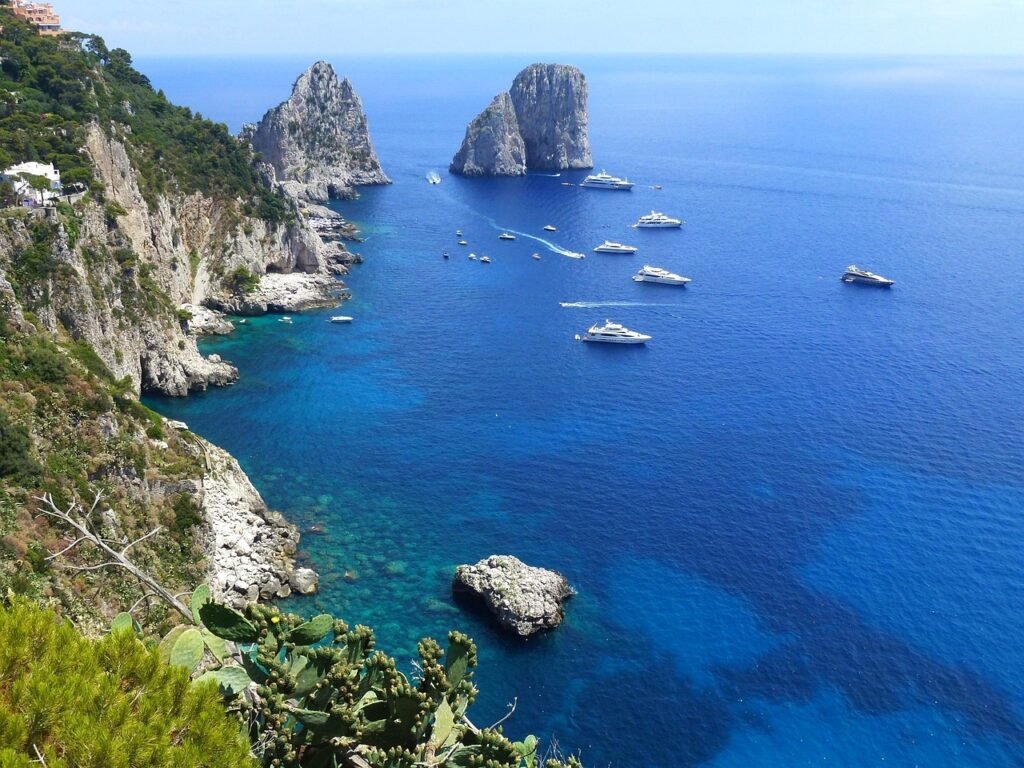 Dramatic sea cliffs and turquoise waters in Capri, Italy