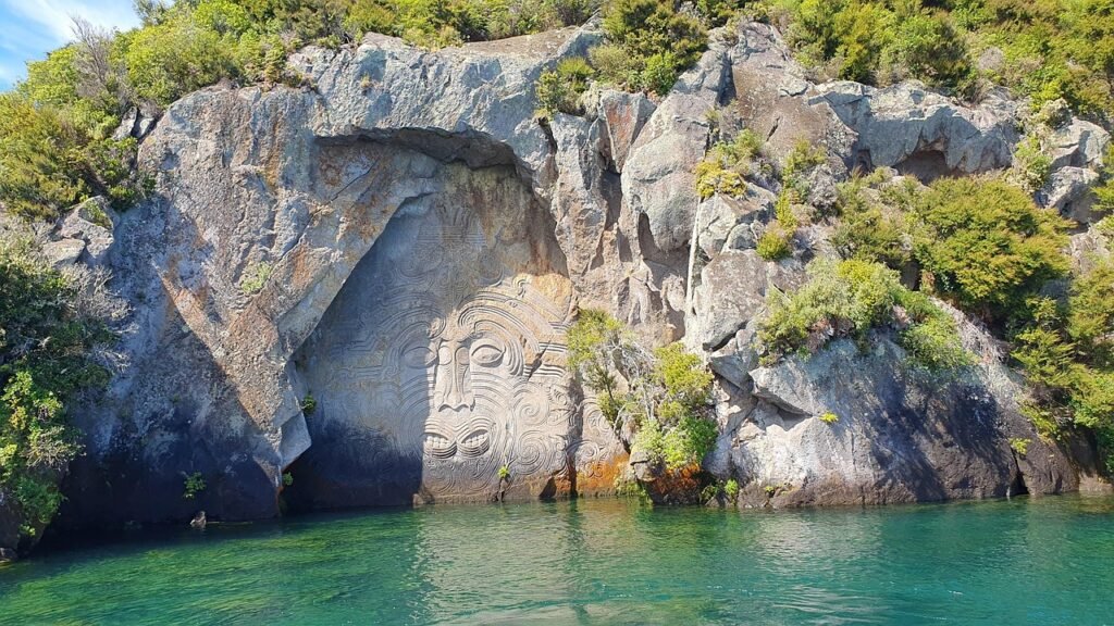 Māori rock carvings overlooking Lake Taupō in New Zealand.