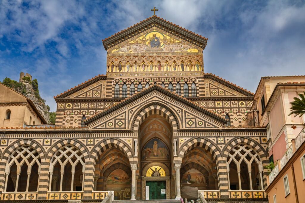 Front view of the Amalfi Cathedral in Italy, showcasing intricate architectural design and artistic details.